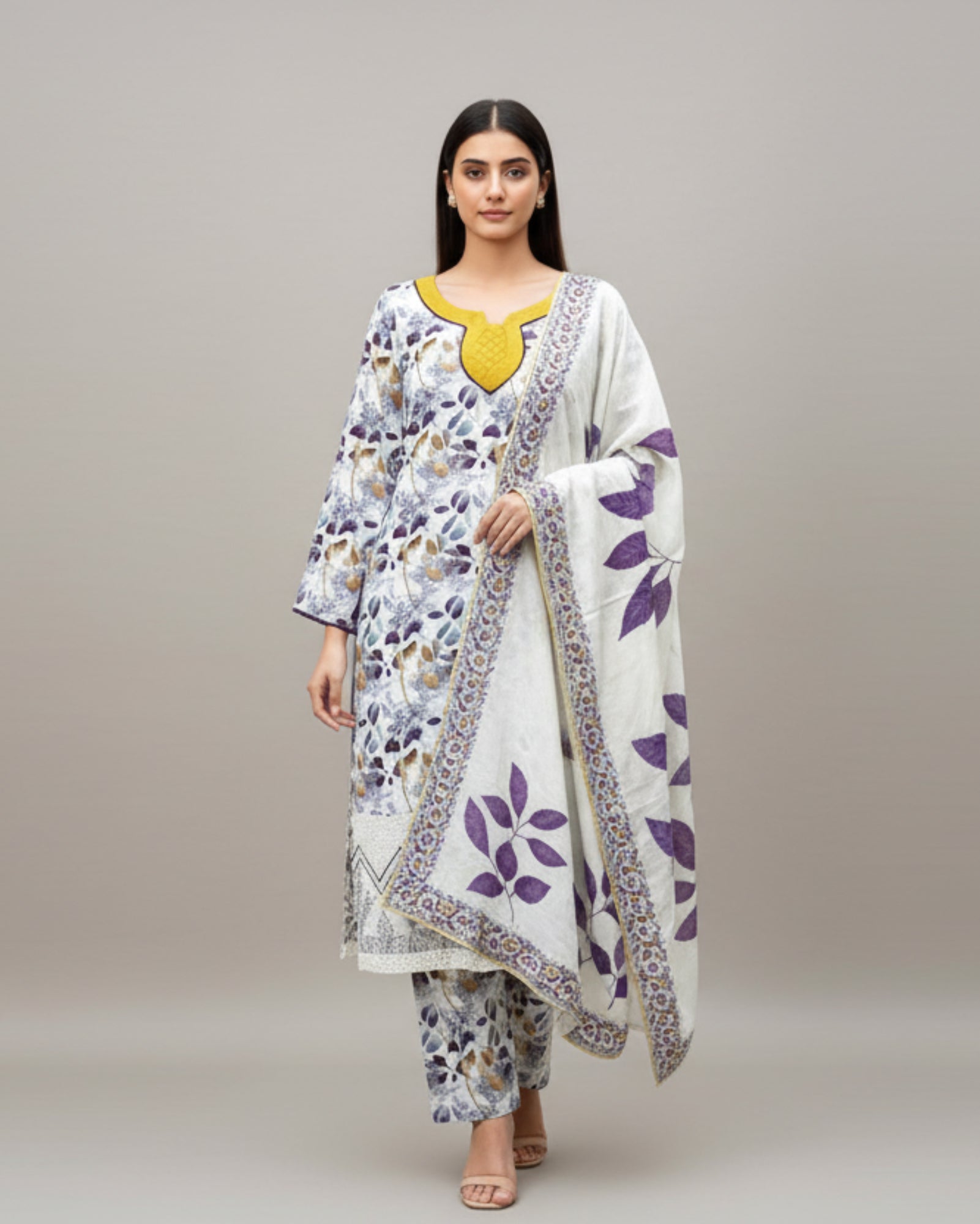 Woman wearing a floral outfit with a white background