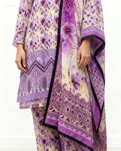 Purple and yellow patterned outfit with a matching dupatta on a white background